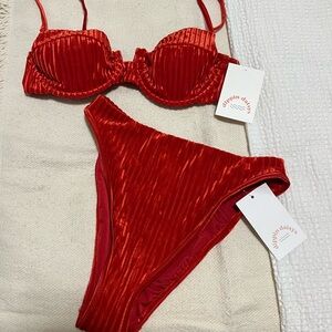 Selling this Dippin Daisys bikini top and bottom (too M, bottom S)